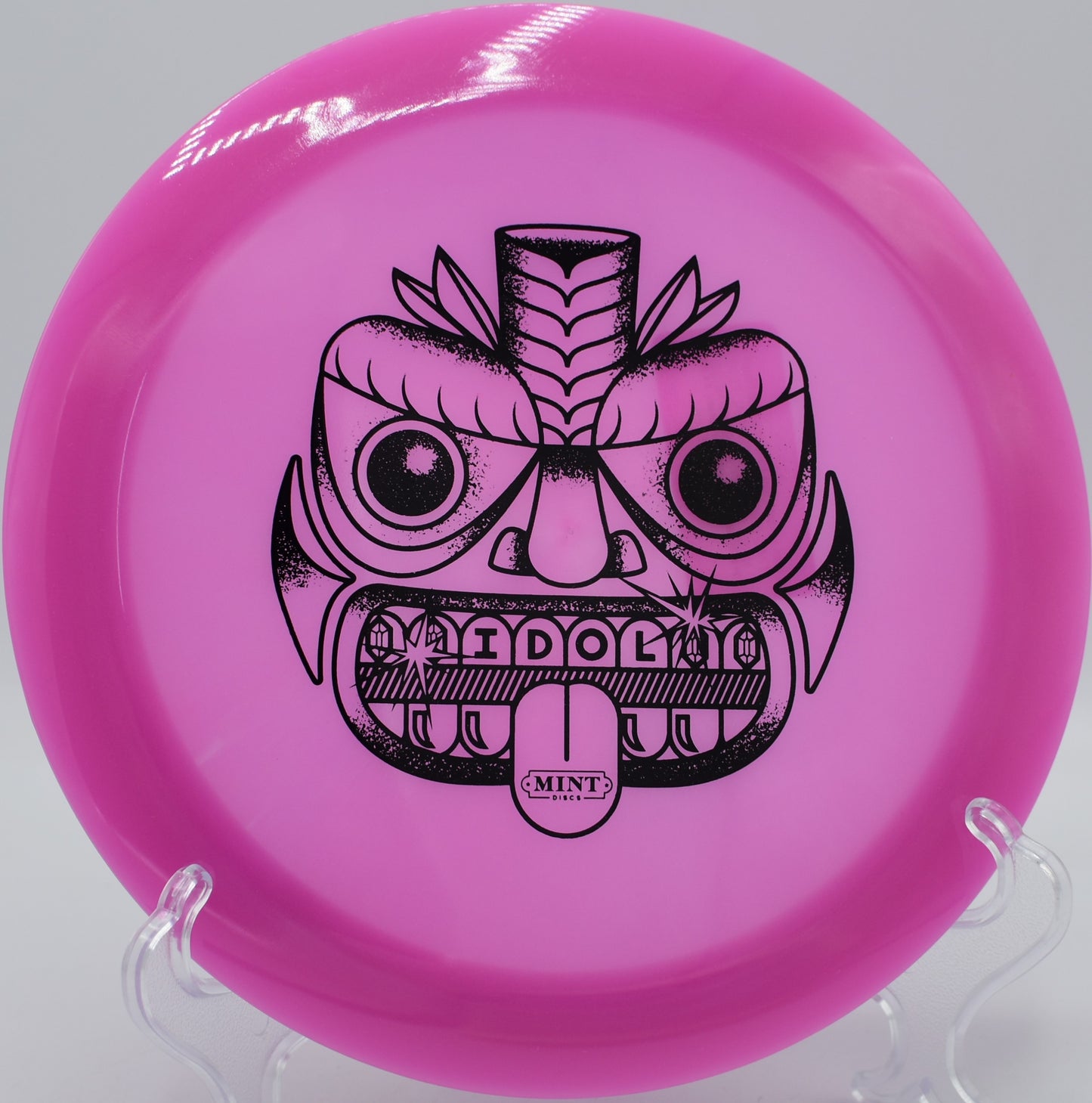 First run Mint Idol distance driver slicing through the air on a long forehand at Hornets Nest in Charlotte, North Carolina