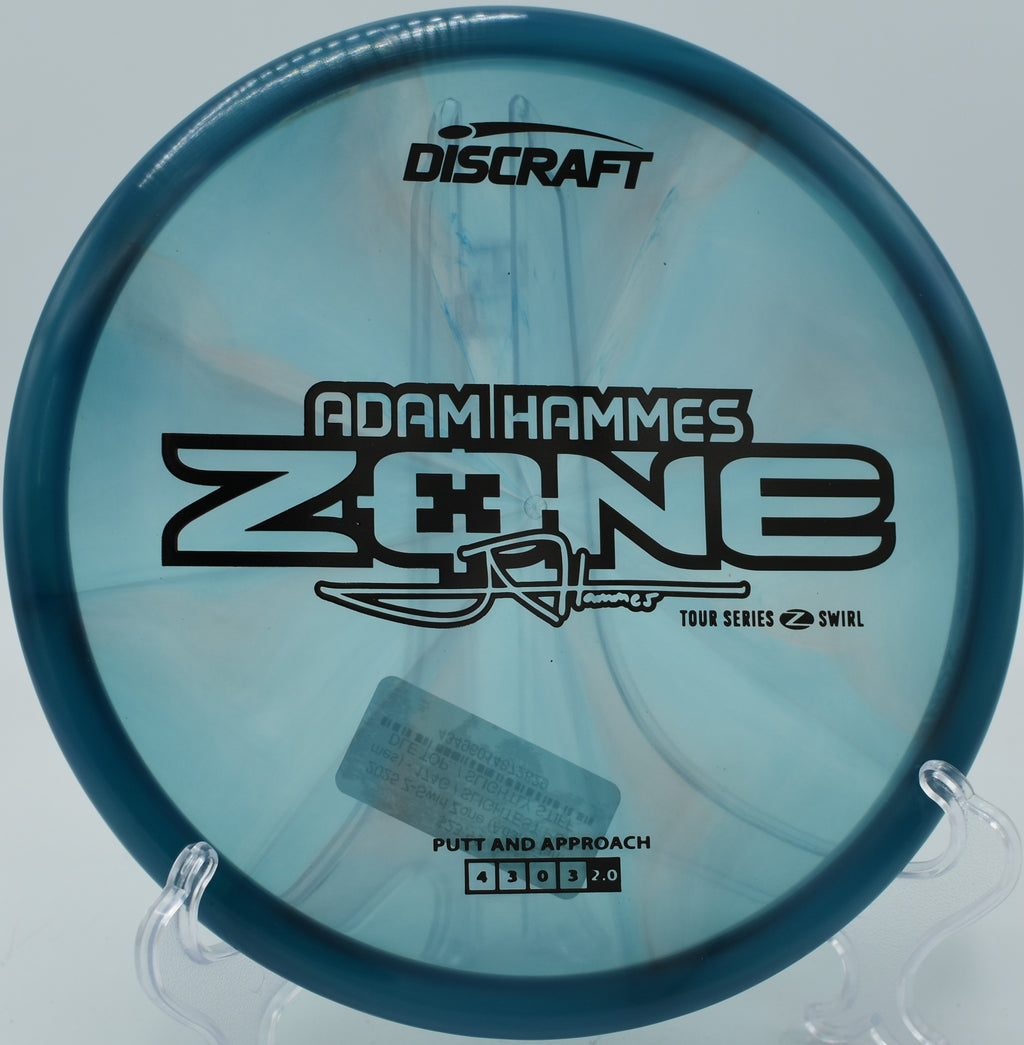 Zone held flat in a player’s grip before forehand release at Branson Trails Disc Golf Course in Missouri.

