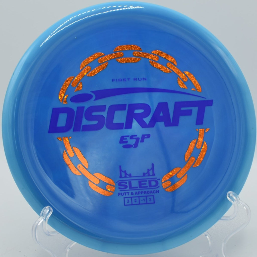 Discraft First Run ESP Sled stable short drive near guarded green at Bud Hill Disc Golf Course in Memphis, Tennessee