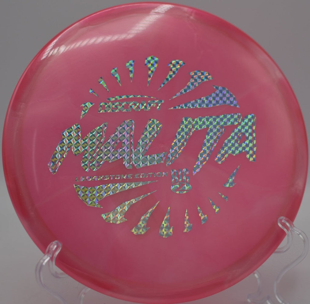 Discraft Big Z Swirl Malita midrange finishing softly near the pin at Fountain Hills Disc Golf Course in Fountain Hills, Arizona