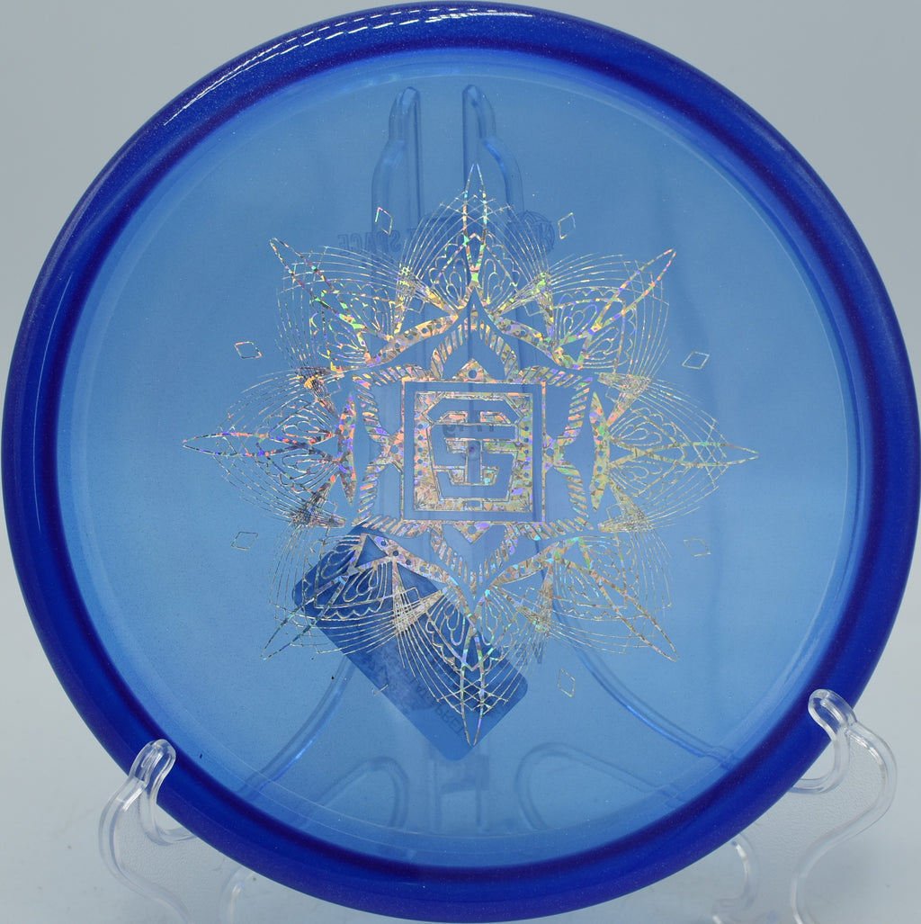 Thought Space Athletics VEX Vessel overstable approach disc skipping off the fairway at Buckhorn Disc Golf Course in New Hill, North Carolina.