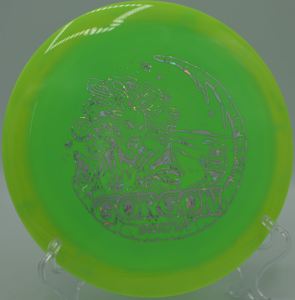 Innova Holiday Halo Gorgon punching through a forest gap at Lincoln Ridge DGC in Independence, KY, fading gently at the end of its glide.