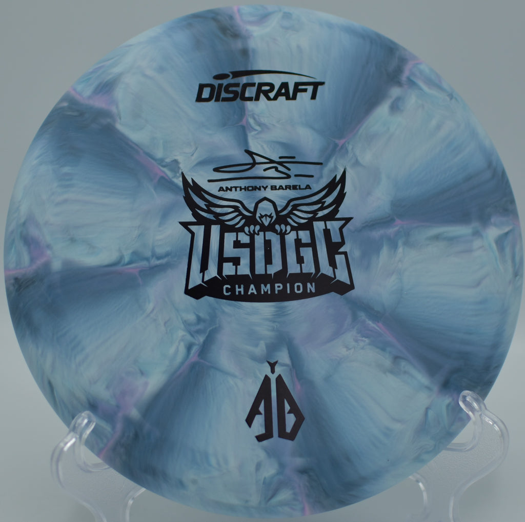 CT Swirl Focus set near tall pines at Kincaid Park DGC in Anchorage, AK, perfect for wind-ready putts.