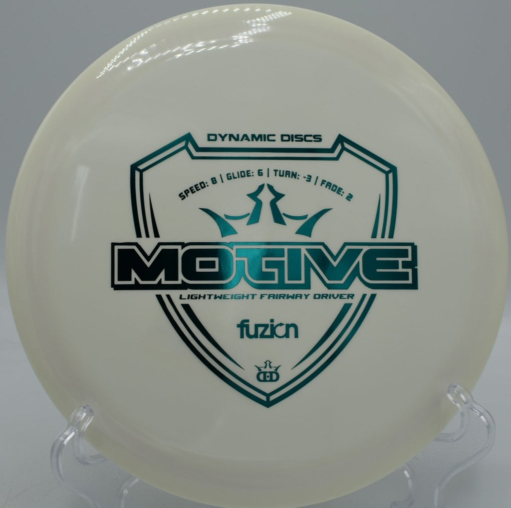 Dynamic Discs Fuzion Motive lightweight control driver flying straight at Toboggan Disc Golf Course Michigan