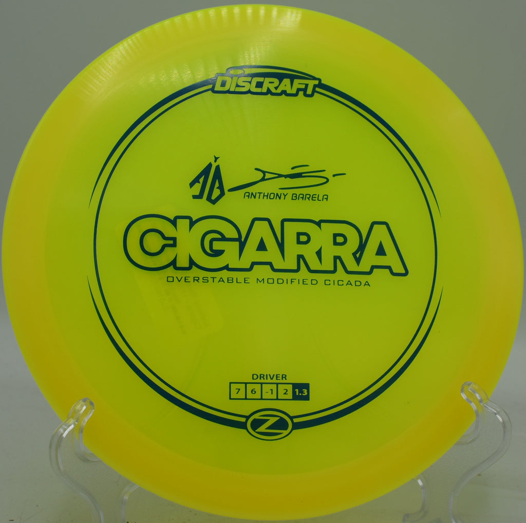 Discraft Cigarra held in forehand grip before a turnover drive at Creekside DGC in Salt Lake City, Utah

