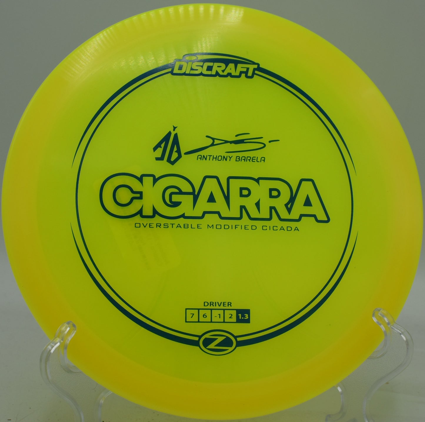 Discraft Cigarra held in forehand grip before a turnover drive at Creekside DGC in Salt Lake City, Utah

