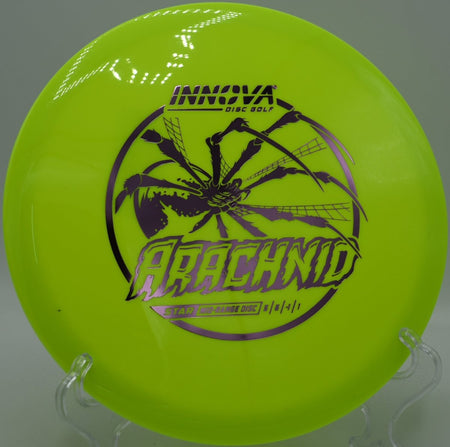 Innova Star Arachnid midrange staged on tee pad for a precision line at Cedar Grove Disc Golf Course in Fairmont, West Virginia