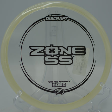 Discraft Z Zone SS carving wooded lines at Sabattus Disc Golf Course in Sabattus, Maine.