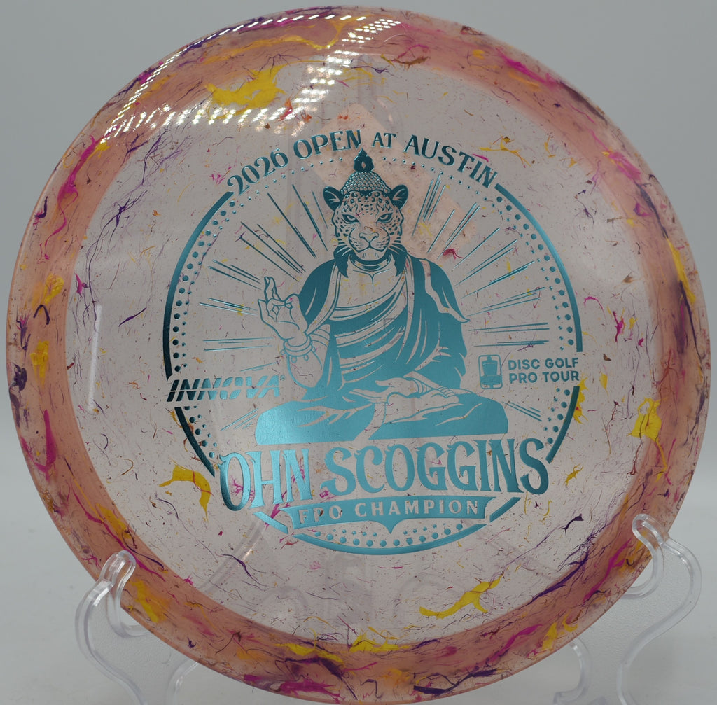 Ohn Scoggins Leopard3 Commemorative edition resting near the basket at Brewster Ridge Disc Golf Course in Smugglers' Notch, Vermont, built for accurate approaches and fairway control