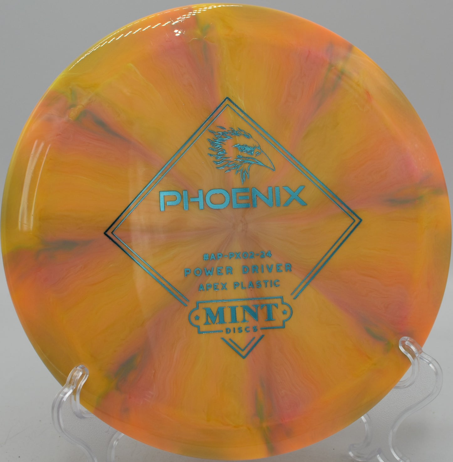 Apex Swirl Phoenix torque-resistant driver carving a flex shot at Northwood Black Disc Golf Course in Morton, Illinois