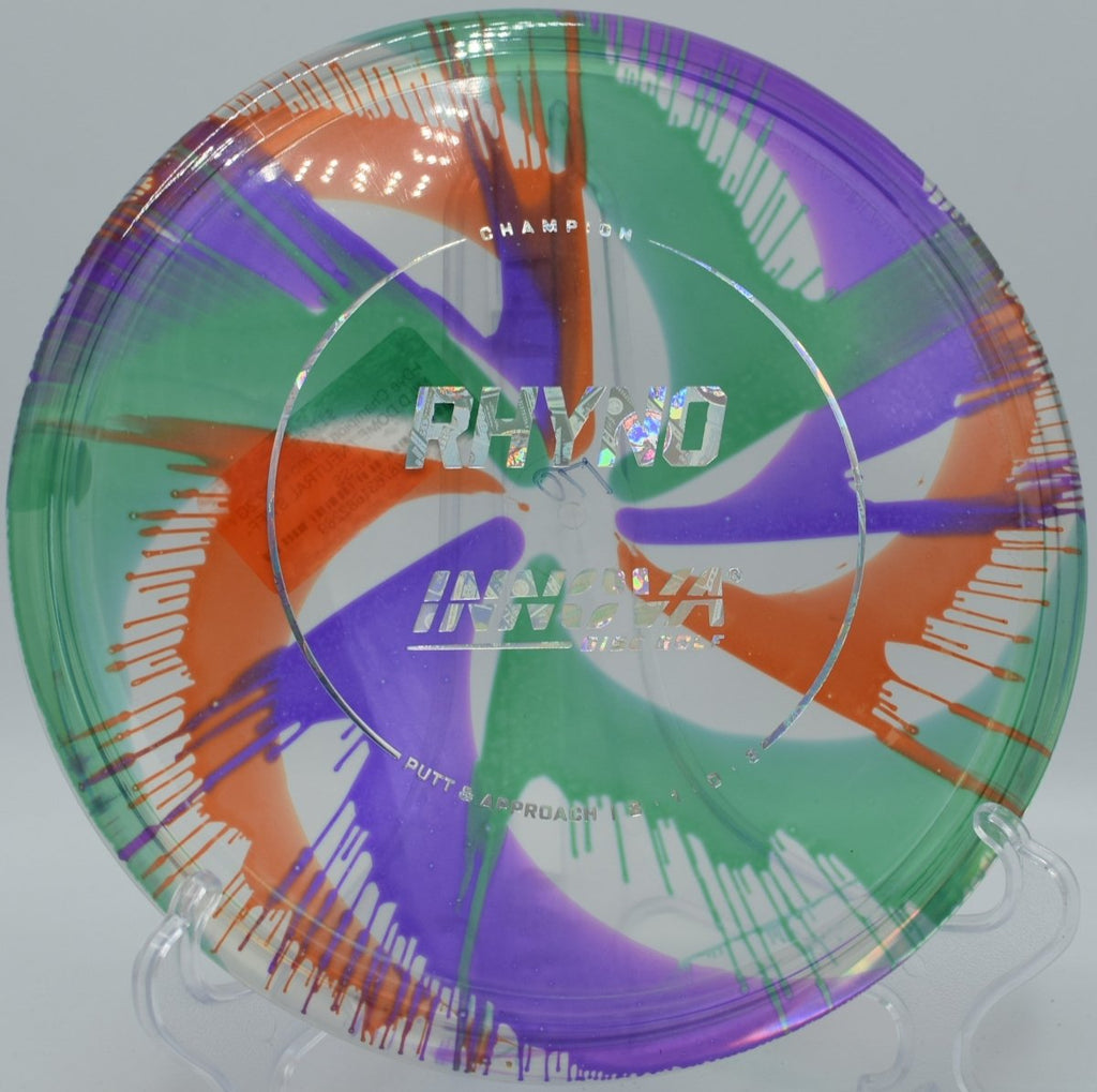 I-Dye Champion Rhyno putter staged for a short hyzer putt at Lake Shawnee Disc Golf Course in Topeka, Kansas