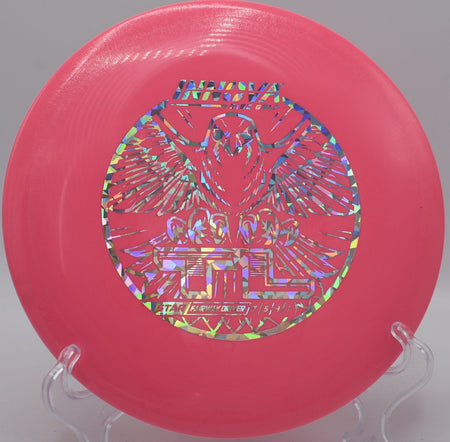 Innova Star TL driver parked near basket after a soft hyzer finish at Huntington Beach Central Park Disc Golf Course in Huntington Beach, California