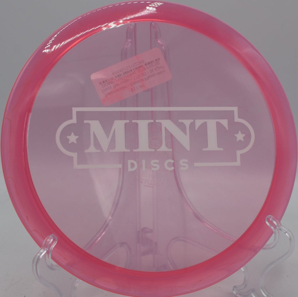 Mint Discs Eternal Salamander fairway driver gliding clean through tunnel at Nevin Park Disc Golf Course in Charlotte North Carolina