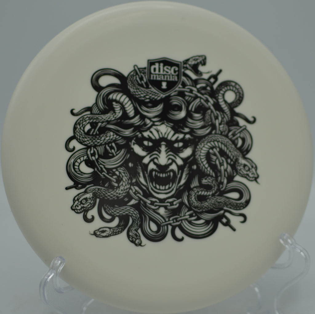 Discmania Exo Soft Lumen Link Medusa Stamp approach putter glowing steady at Northwood Black Disc Golf Course in Morton, Illinois.