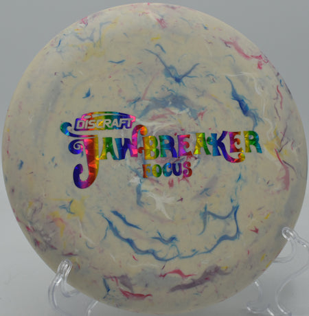Colorful Jawbreaker Focus spinning low over grass at Winthrop Arena in Rock Hill, SC.

