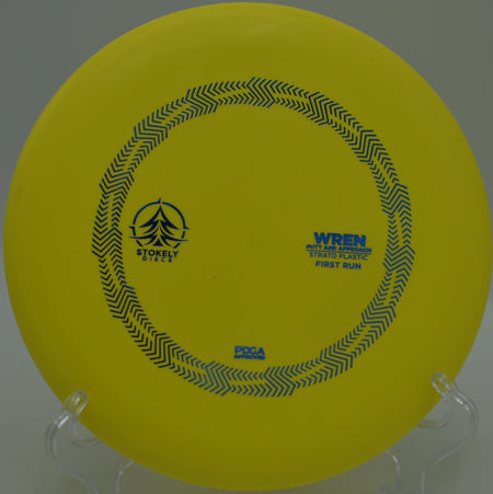 Player lining up a confident circle putt with the Strato Wren at Flip City Disc Golf Course in Shelby, Michigan.