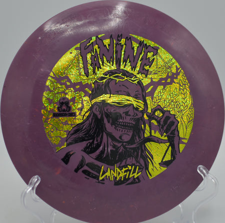 Doomsday Landfill Famine floating a smooth distance drive at McCurry Park DGC in Fayetteville, GA, riding a controlled turnover to circle-easy range.