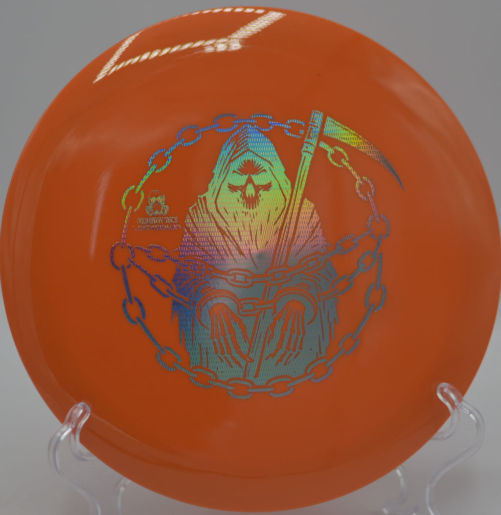 Survival Lockdown punching through a low ceiling at Turtle Creek DGC in Greenville, WI, flying flat and dumping left right on target.