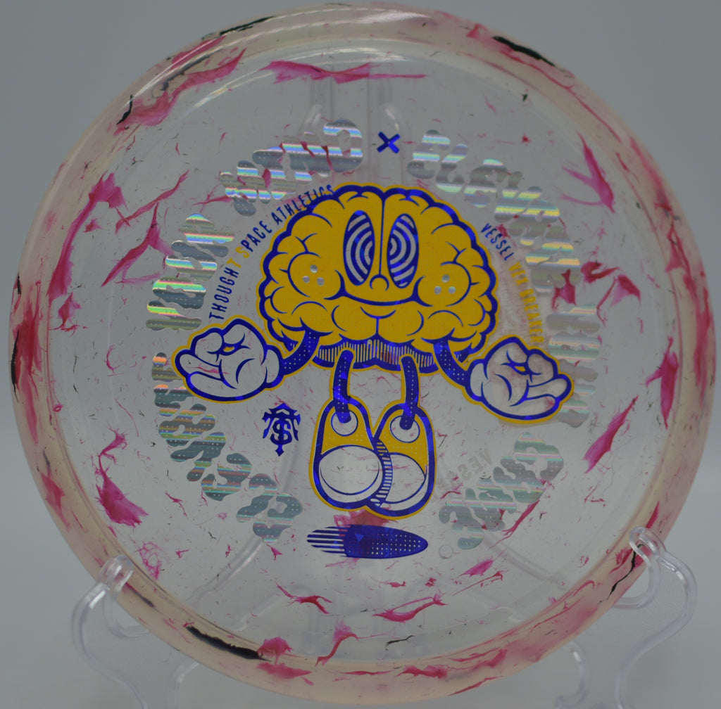 Player launching a Vex Breaker Vessel high over the fairway at Quaker’s Challenge Disc Golf Course in Franklin, Pennsylvania.