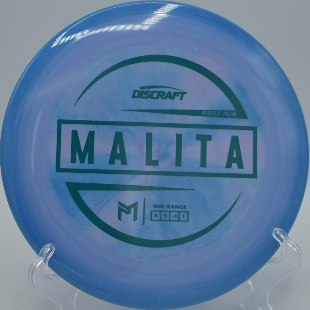 Paul McBeth First Run ESP Malita gliding perfectly straight toward the basket at Dillon Park Disc Golf Course in Noblesville, Indiana.