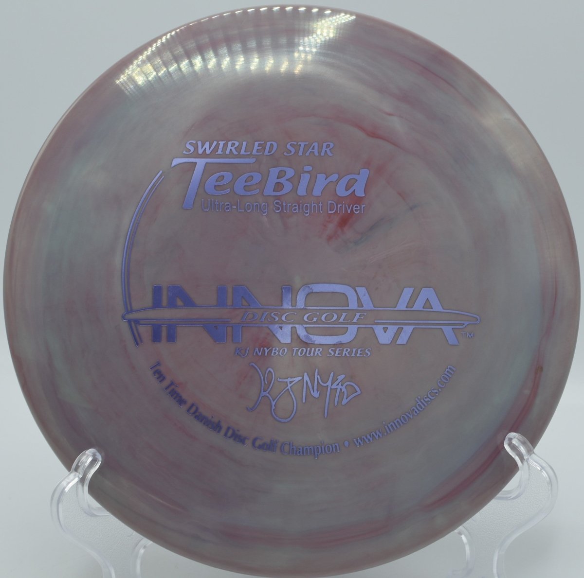 KJ Nybo Swirly Star TeeBird fairway driver carving a tight, dead-straight tunnel at Stafford Woods Disc Golf Course in Voorhees, New Jersey, holding clean angle control with steady glide and a dependable fade for precision-driven disc golf shots