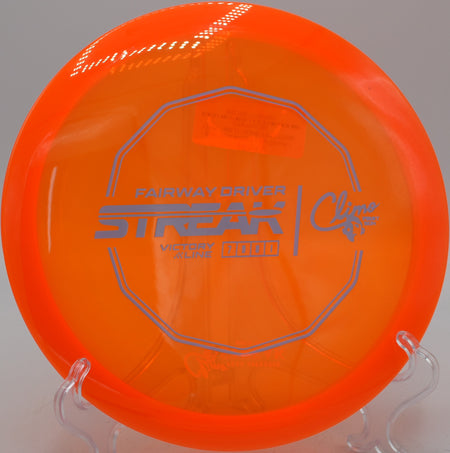 Victory Line Streak by Climo Discs thrown flat with soft fade at Idlewild Disc Golf Course in Burlington, KY