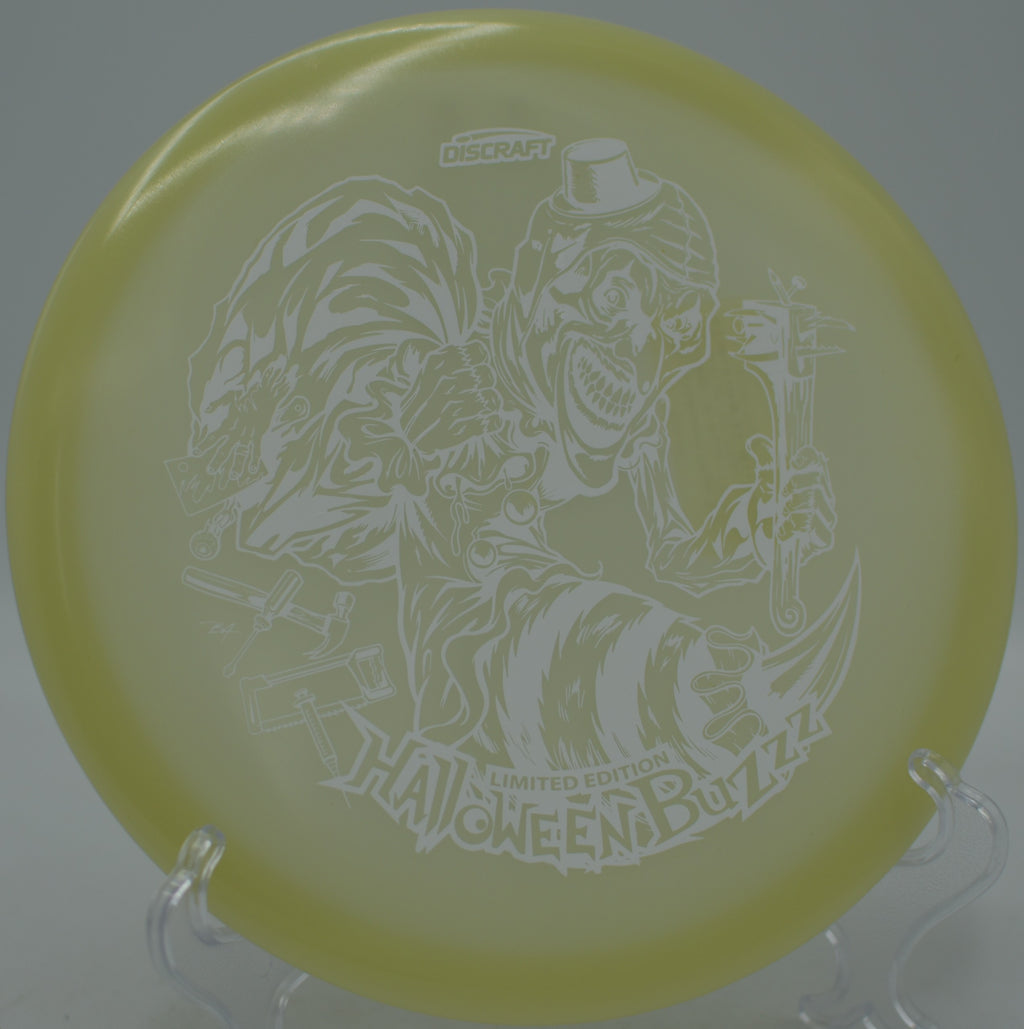 Halloween Mega Glo 2025 Single Stamped Buzzz glowing perfectly down a fairway at Eagles Crossing Disc Golf Course in Hawk Point, Missouri.