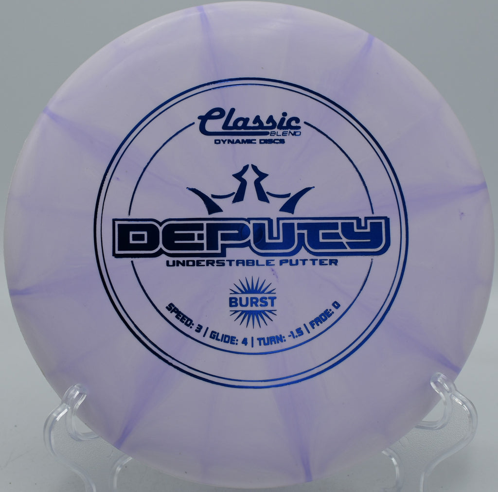 Classic Blend Burst Deputy Dynamic Discs finesse putter gliding on approach at Stafford Woods Disc Golf Course in Voorhees, New Jersey.
