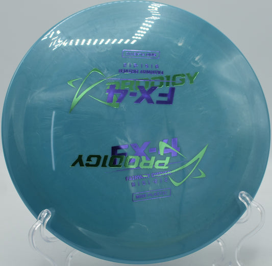 FX-4 500 Plastic F2 from Prodigy shaping a controlled turnover at North Boundary Park Disc Golf Course in Cranberry Township, Pennsylvania.