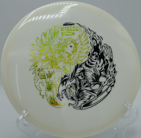 Z Glo Colorshift Buzzz spinning on a flat release at Hornets Nest Disc Golf Course in Charlotte, North Carolina, built for reliable midrange control in any light.

