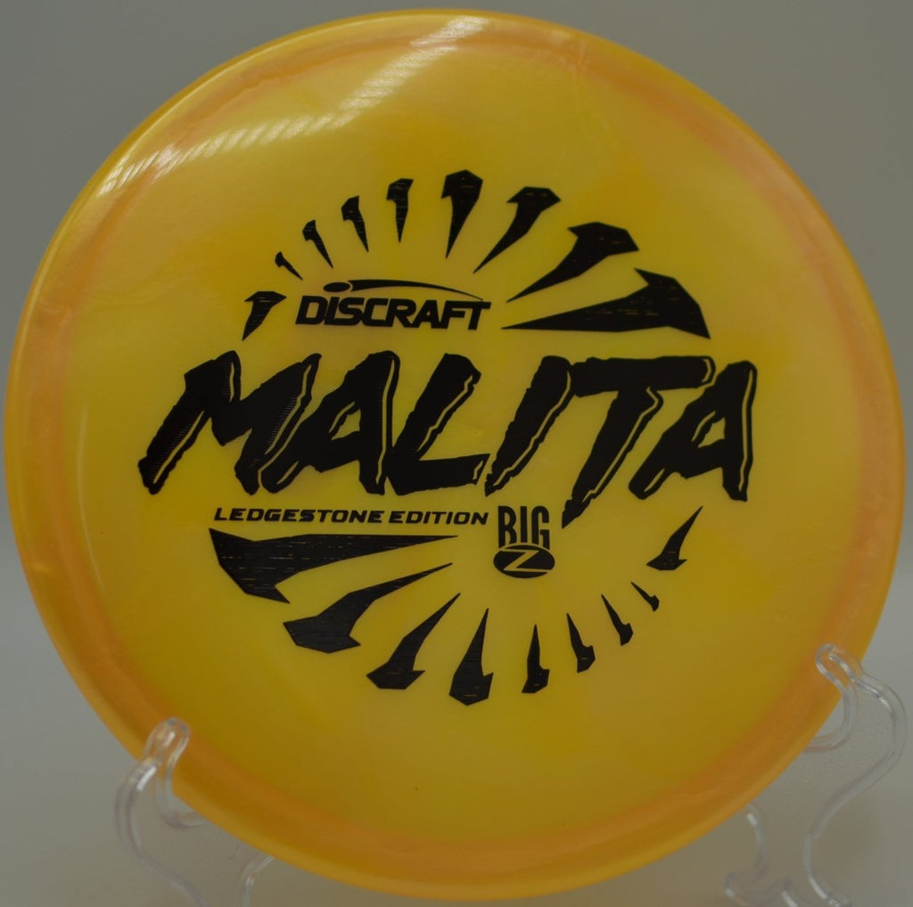 Discraft Malita midrange with beadless feel gliding smoothly at Moraine State Park Disc Golf Course in Portersville, Pennsylvania