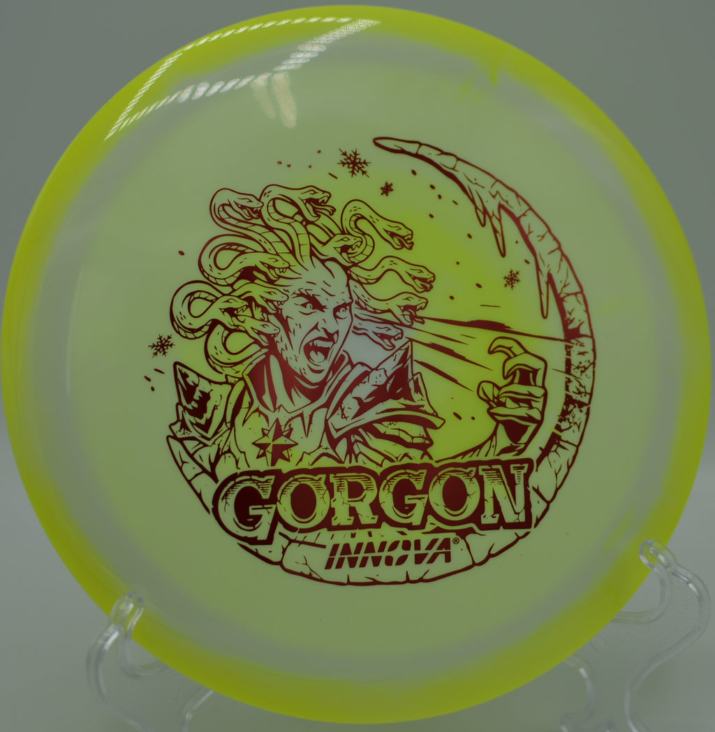 Innova Halo Gorgon Holiday Edition sailing a long flat drive at Lemon Lake Gold DGC in Crown Point, IN, maximizing glide across open fairway.