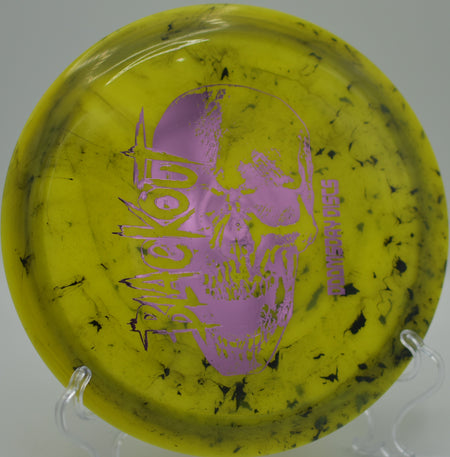 Biohazard Blackout launching a finesse backhand at Harris Lake DGC in New Hill, NC, flipping to flat and riding its high glide down the fairway.