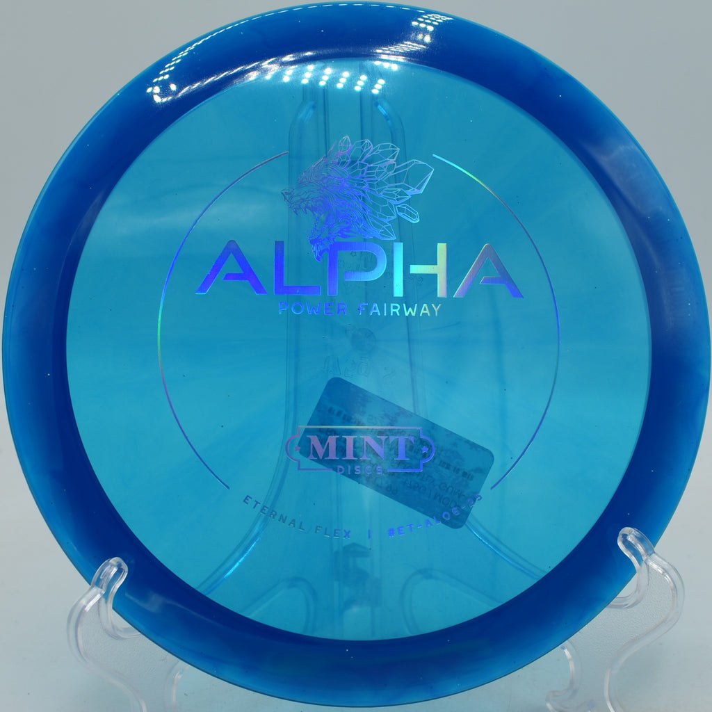 Mint Discs Eternal Flex Alpha reliable fairway driver parked on a flex line at Circle C Ranch Disc Golf Course in Austin, Texas.