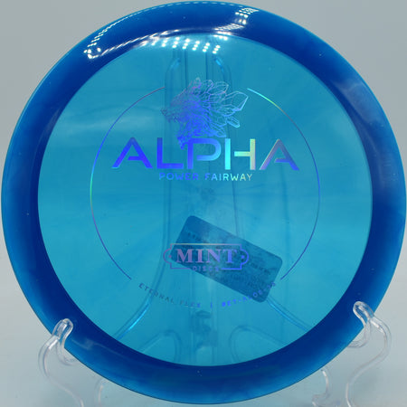 Mint Discs Eternal Flex Alpha reliable fairway driver parked on a flex line at Circle C Ranch Disc Golf Course in Austin, Texas.