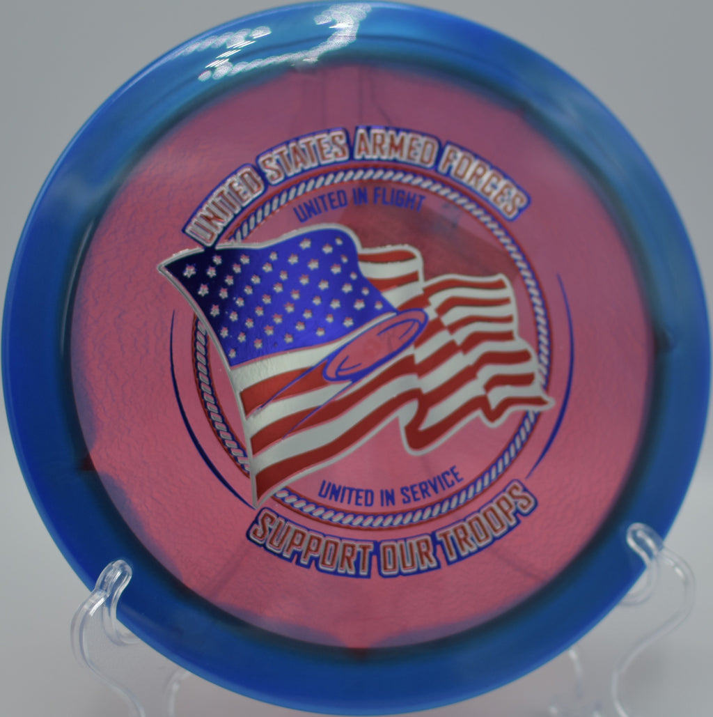 Halo Champion Firebird with Support Our Troops stamp photographed on the hillside fairway at Morningside DGC in Sioux Falls, SD, showcasing its elite forehand performance.