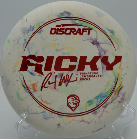 Ricky Wysocki Signature Jawbreaker Focus reliable putter dropping under the basket at Hornets Nest Disc Golf Course in Charlotte, North Carolina.