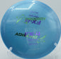 Factory Second Prodigy FX-4 in 500 Plastic gliding down a wooded fairway at The Blockhouse Disc Golf Course in Spotsylvania, Virginia.