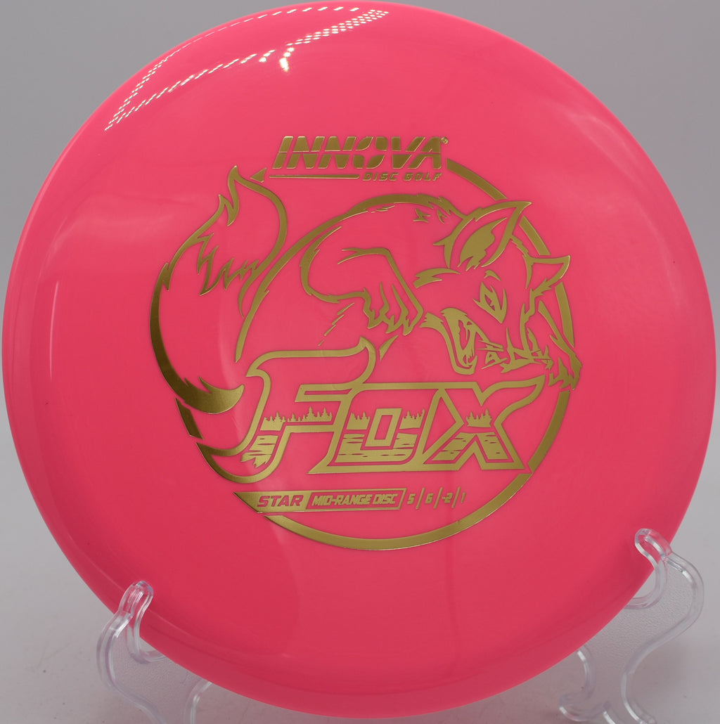 Innova Star Fox workhorse midrange settling beside the basket at Fox Run Meadows Disc Golf Course in Jeffersonville, Vermont.