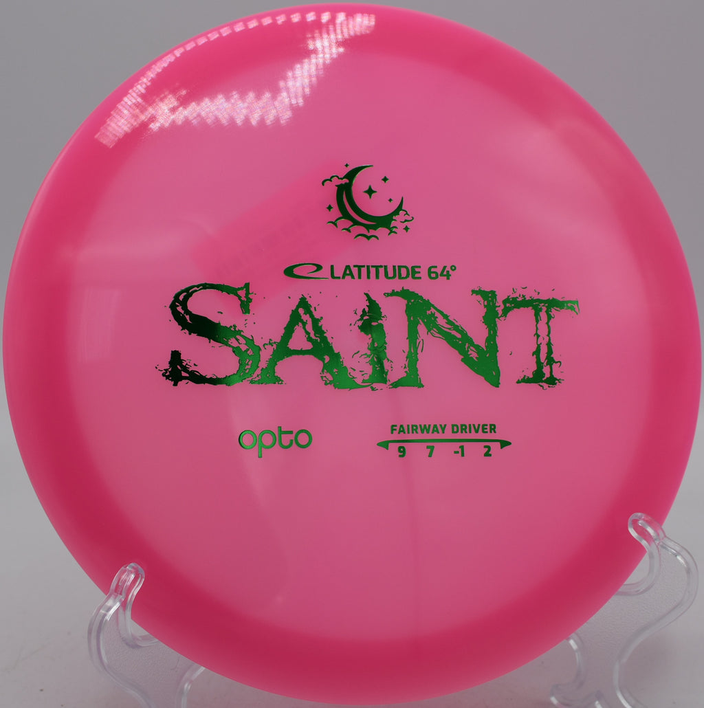 Opto Moonshine Saint Latitude 64° glow plastic disc parked circle one at Blue Ribbon Pines Disc Golf Course in East Bethel, Minnesota.