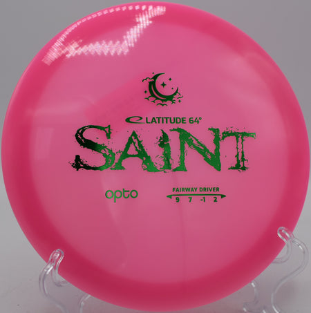 Opto Moonshine Saint Latitude 64° glow plastic disc parked circle one at Blue Ribbon Pines Disc Golf Course in East Bethel, Minnesota.