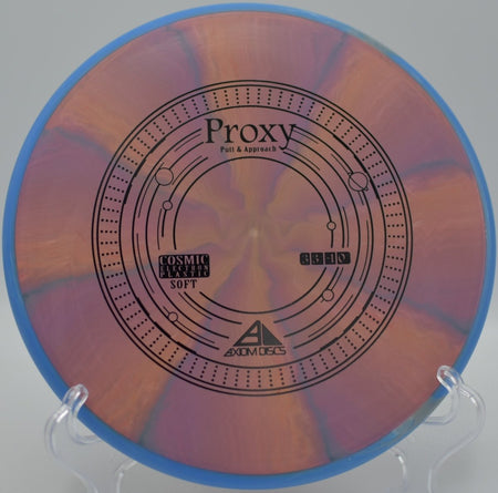 Cosmic Electron Soft Proxy from Axiom sticking softly near the pin on a controlled approach at Jones Supreme Disc Golf Course in Emporia, Kansas