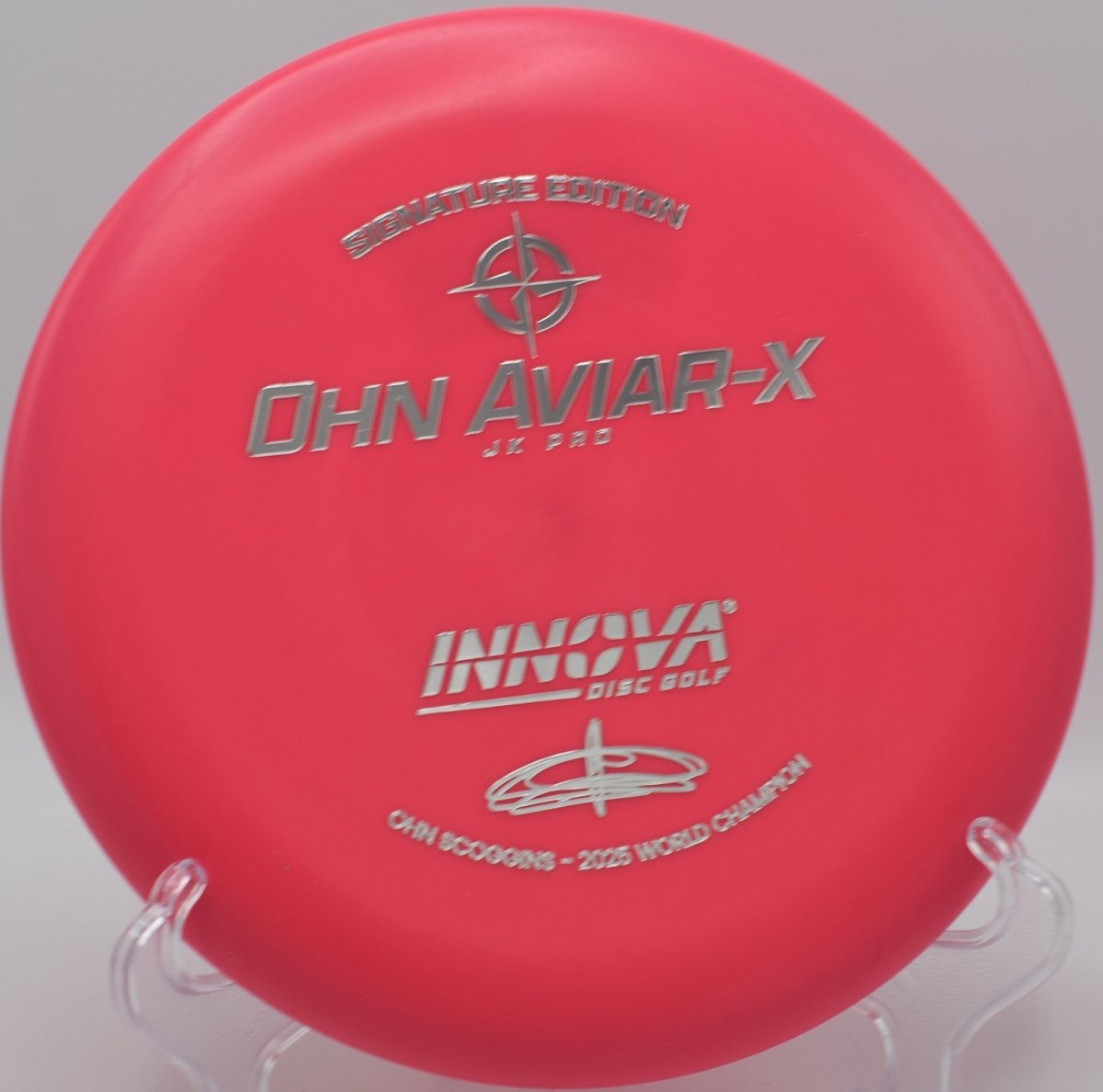 JK Aviar-X putter beside the cage after a controlled upshot at Diavolo Disc Golf Course in Cary, North Carolina