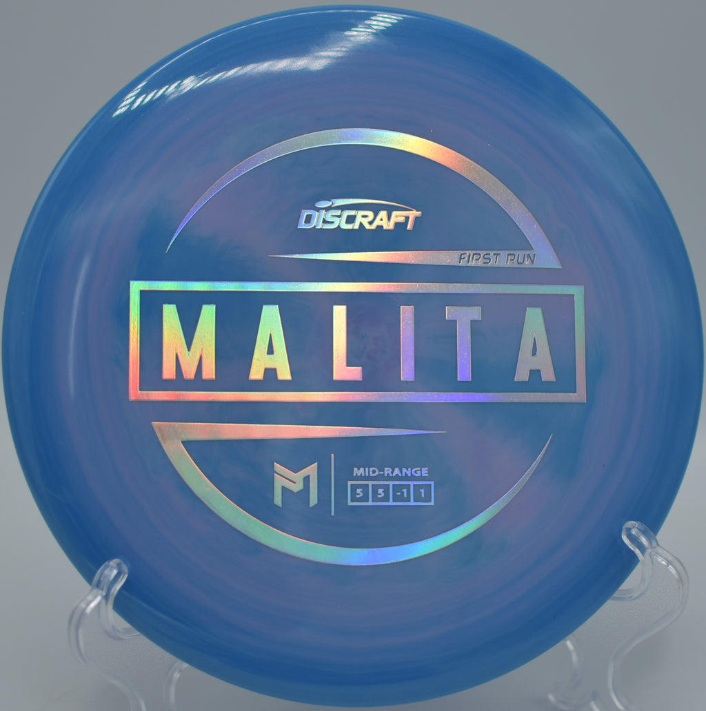 Discraft ESP Malita holding a smooth turnover line through the woods at Lemon Lake Gold Disc Golf Course in Crown Point, Indiana.