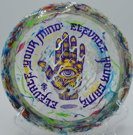 Thought Space Athletics Vex Breaker Requiem driver flying over wooded gaps at Northwood Black Disc Golf Course in Morton, Illinois.