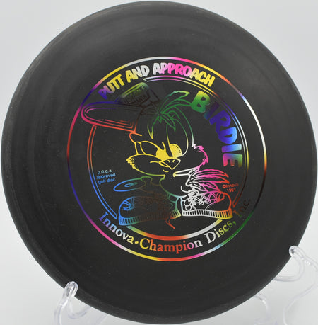 Innova DX Birdie showcasing a smooth release at Pioneer Park Disc Golf Course, Wyoming.