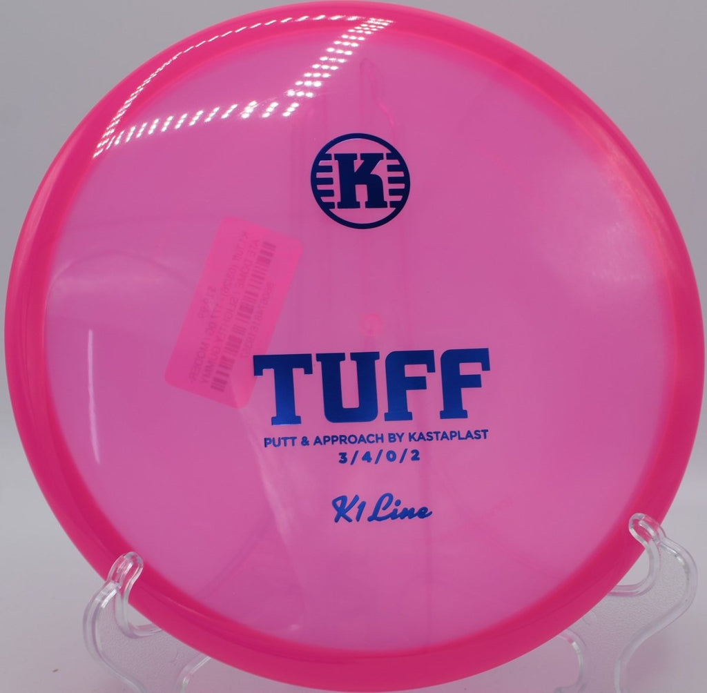 Kastaplast Tuff putter parked on the putting surface after a soft hyzer approach at Springfield Disc Golf Course in Springfield, Oregon