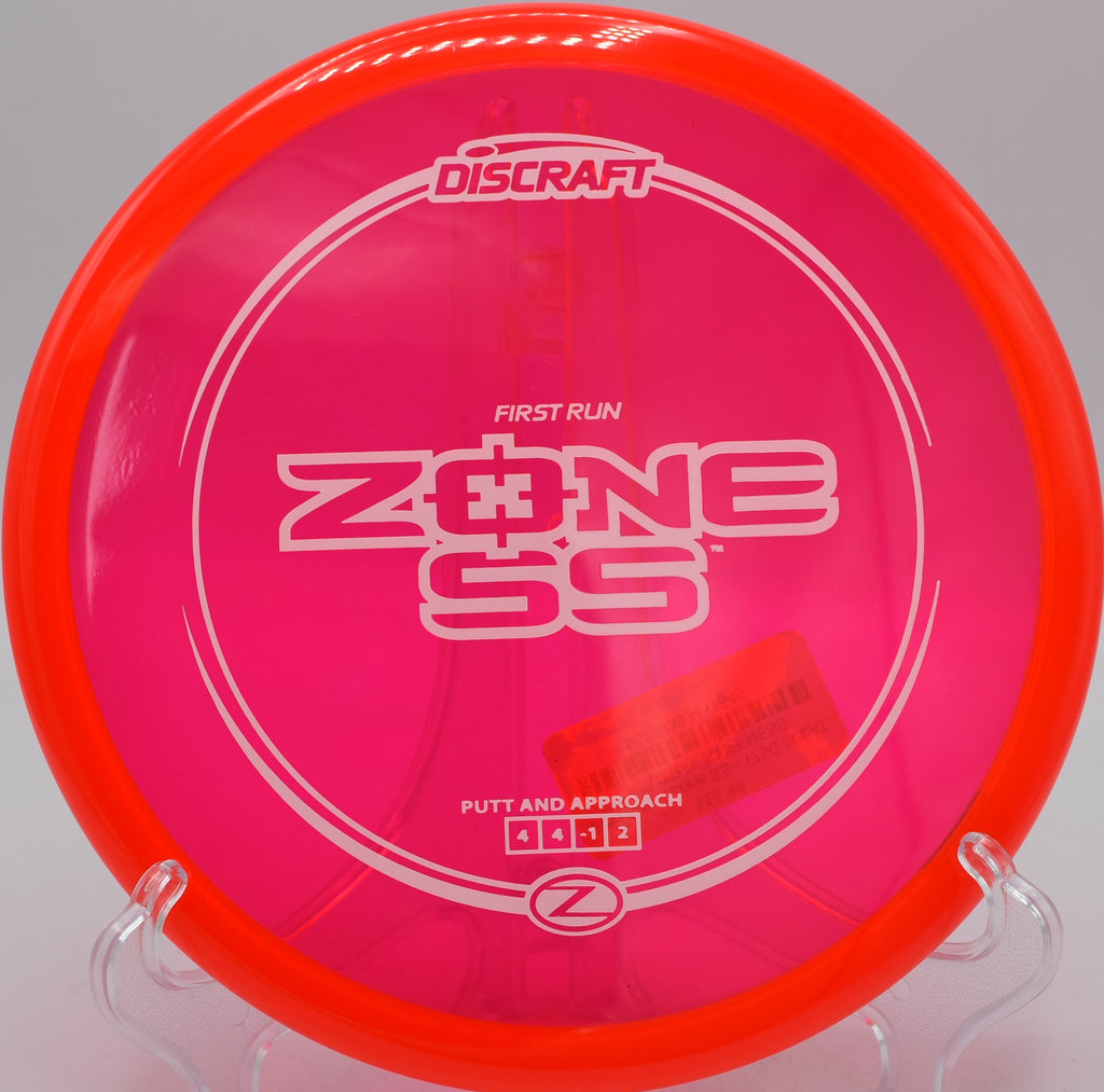 First Run Zone SS Z plastic caught mid-turnover at Rivery Park in Georgetown, TX