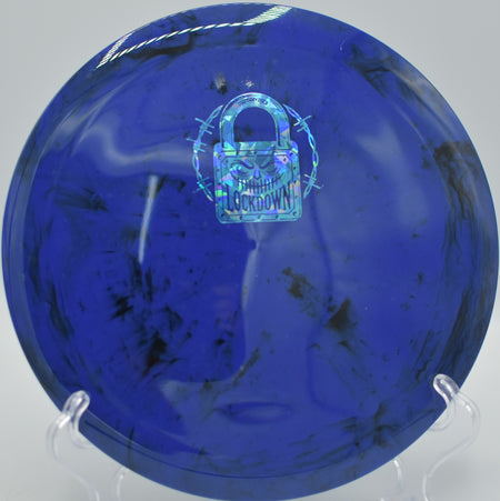 Shockwave Lockdown ripping a power forehand at Devens DGC in Devens, MA, holding torque before slamming into a heavy, controlled fade.