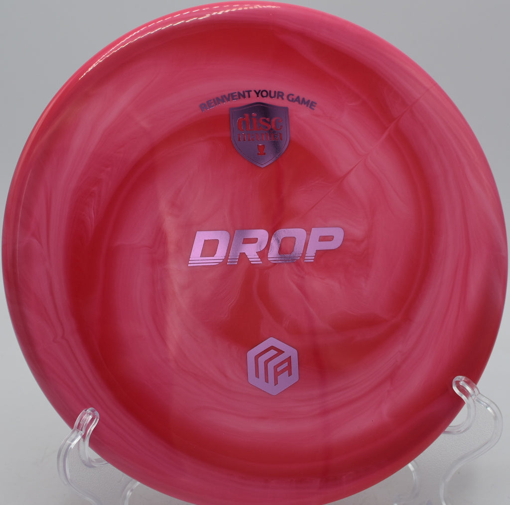 Swirl S-Line Drop Creator Series disc launched on a smooth turnover line at DeLaveaga Disc Golf Course in Santa Cruz, California